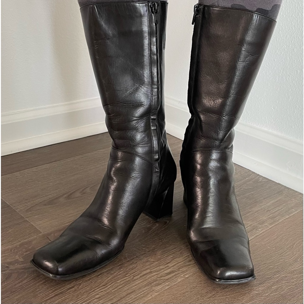 Square toed, black leather boots